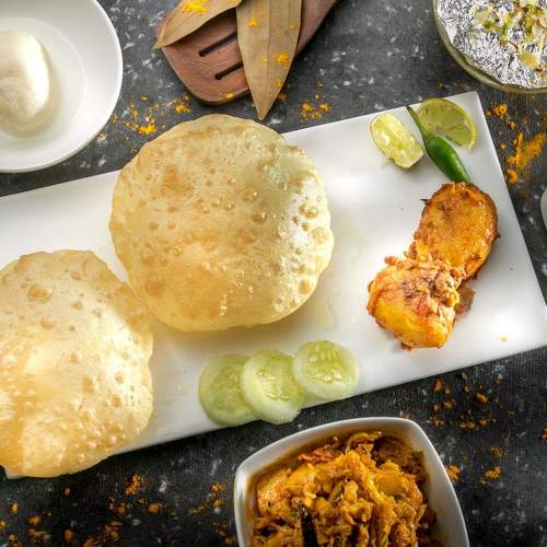 Luchi aloor dum, a famous bengali dish.