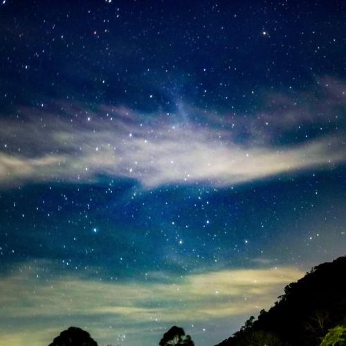 A galaxy above the hills