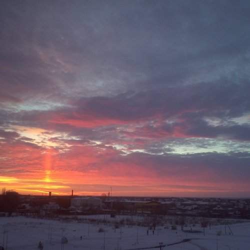 Вечер в городе на закате