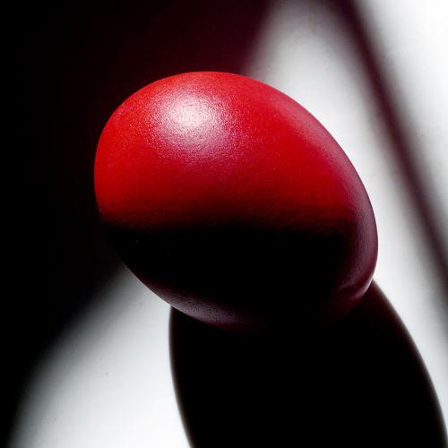 Composition with a red egg.