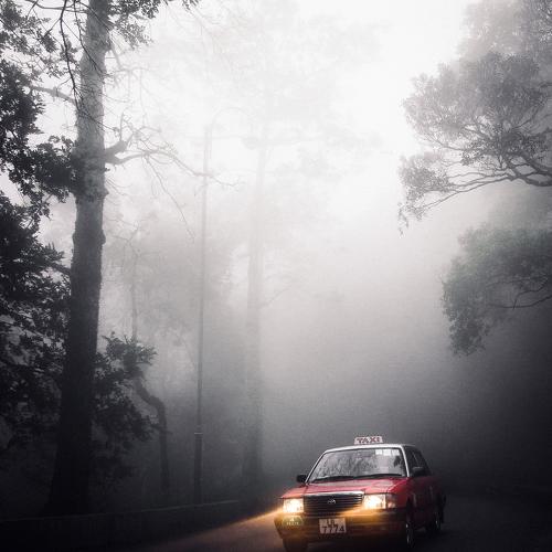 car in the fog.