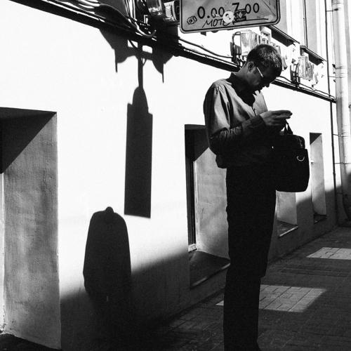 Tall man on street