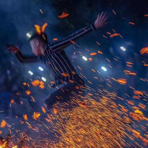 Jump barefoot on fire