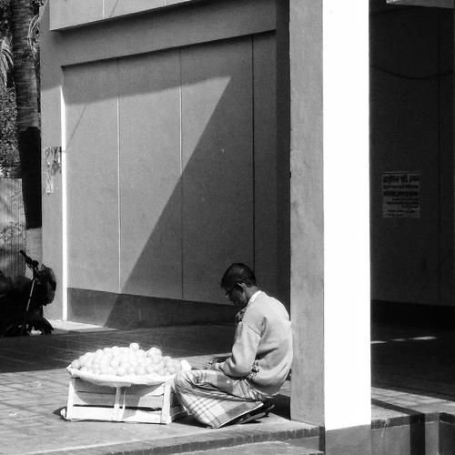 A sad orange seller.