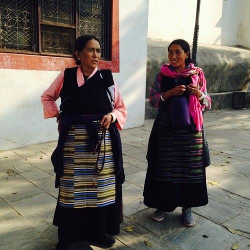 Nepalese women in traditional clothes in Swayambhunath temple