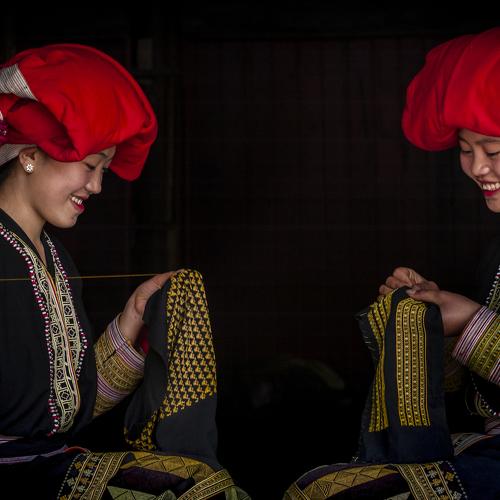 Young woman sewing clothes