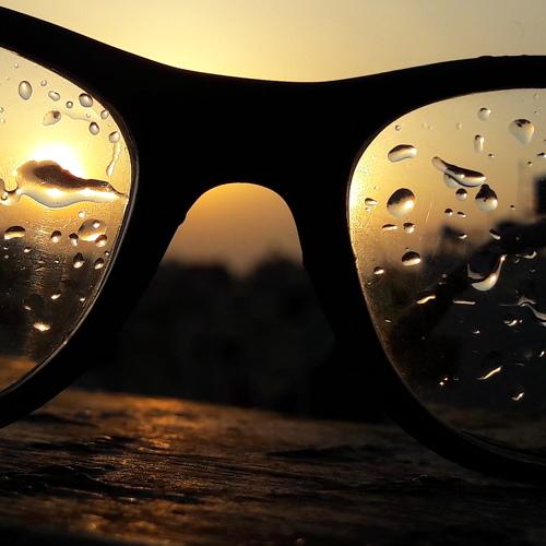 Sunset water drop on spectacles
