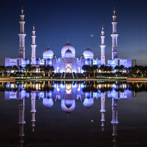 Mosque with reflection of natural water.