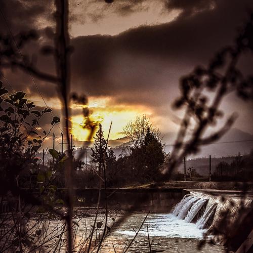 Waterfall with the sunset