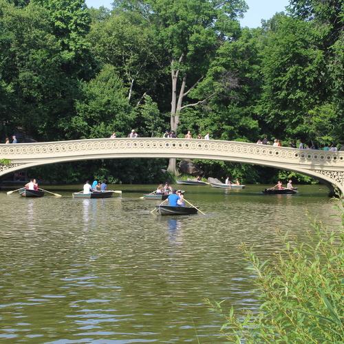 a boat ride under the bow bridge