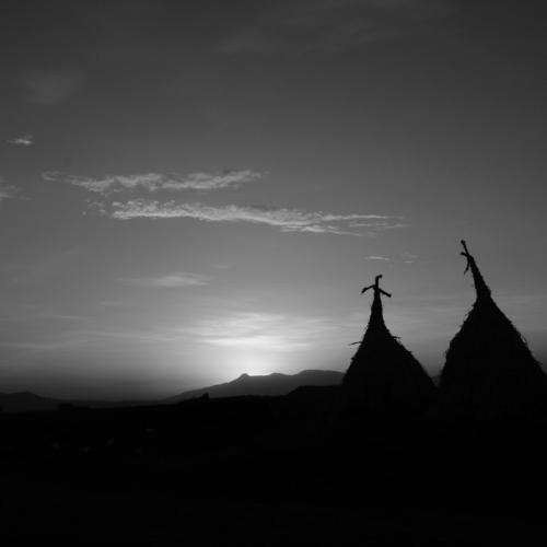 sunset vs traditionally made shelter.