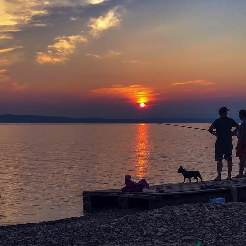 fishermen on the lake