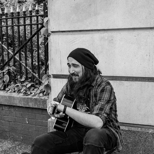Самобытный уличный музыкант