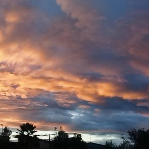 Sunrise against night