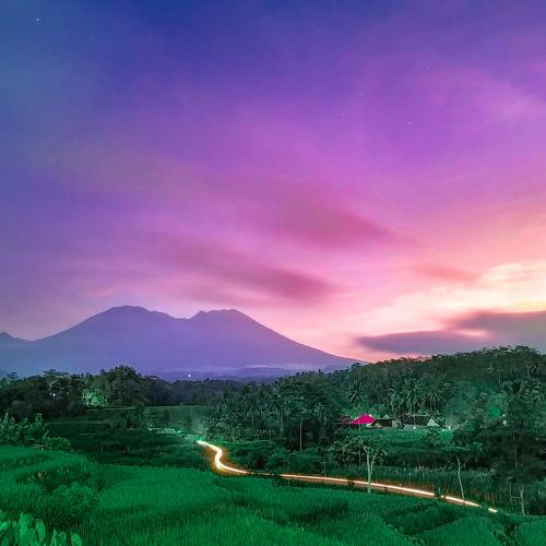 Beauty sunrise moment at ricefield gogoniti with view Kawi Mountain