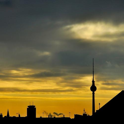 Beautiful and cloudy dawn over the city of Berlin