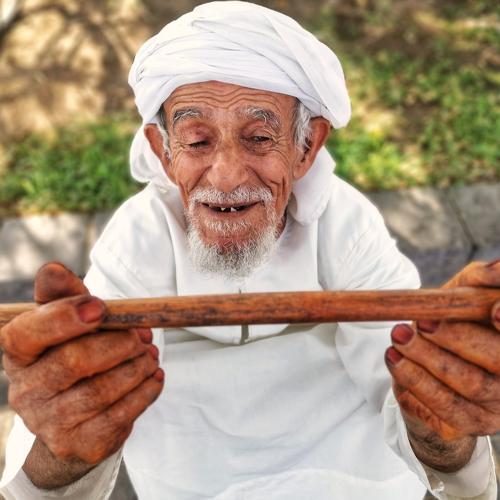 Old Man with the Wooden Stick