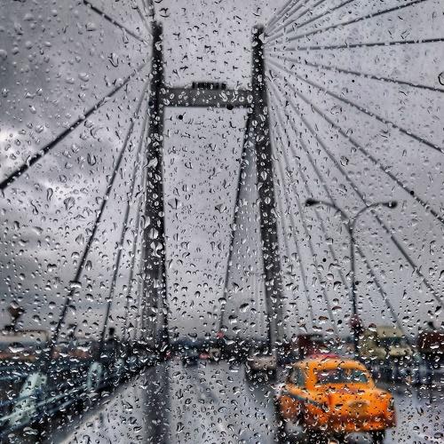 Yellow taxi in a Rainy Day