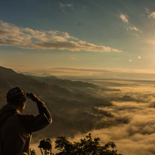 The sun rises from Lolai, the country above the clouds