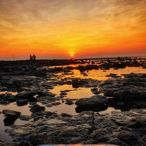 Sunset symmetry photo with two couples