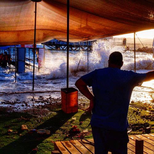 A man watching the storm on the Red Sea