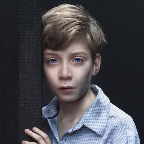 The boy with the striped pyama