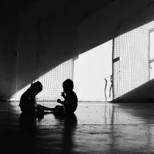Behind the light
