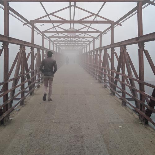 A lonely walk  through fog