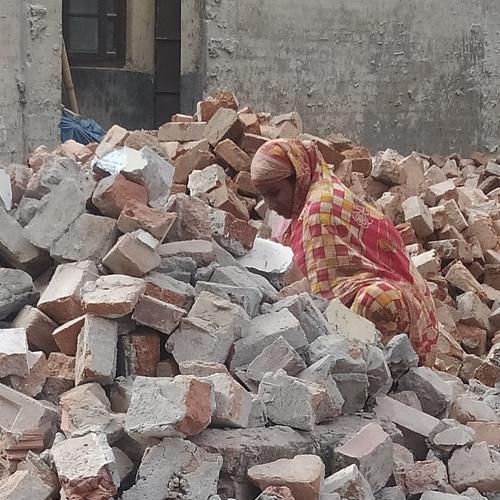 Brick-breaking worker