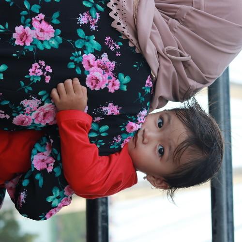 In the arms of Mom