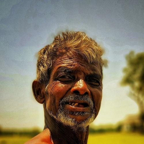 Village old man with strange expression
