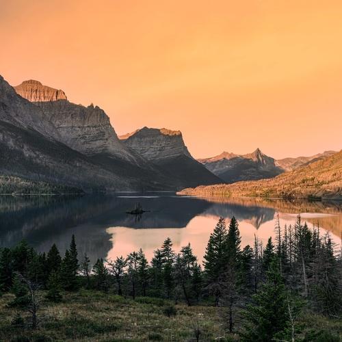 A mountain range by the lake