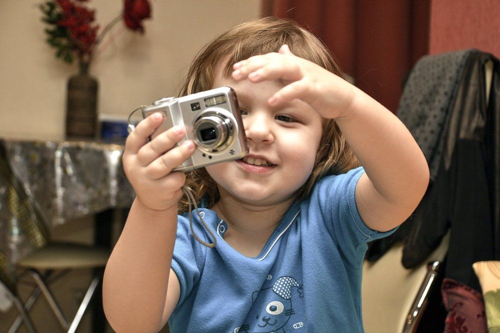 Юный фотограф