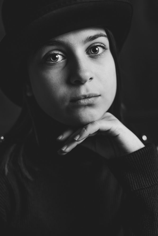 The girl in black hat